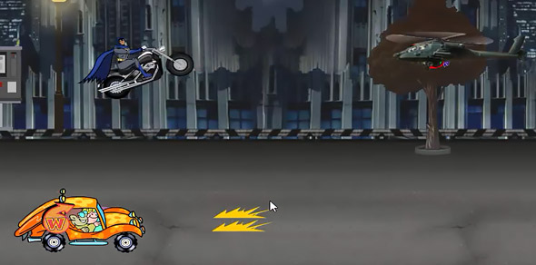 Batman Street War: Use jumping ramp to get up in the air and shoot at helicopters image of Batman Street War: Batman firing missiles at helicopter